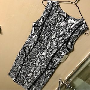 Stretchy snakeskin pattern dress with black piping